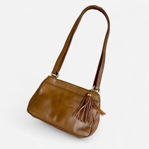 Vintage 90s brown leather shoulder bag with fringe tassel and gold hardware